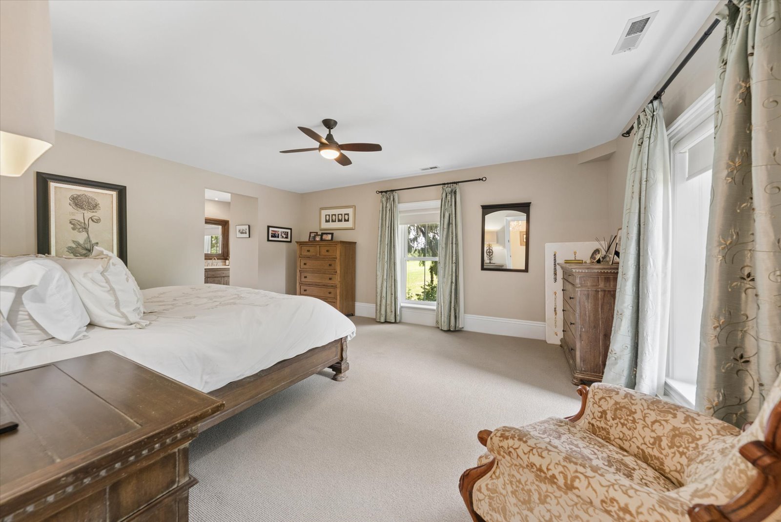 Principal bedroom with ensuite beyond and field views
