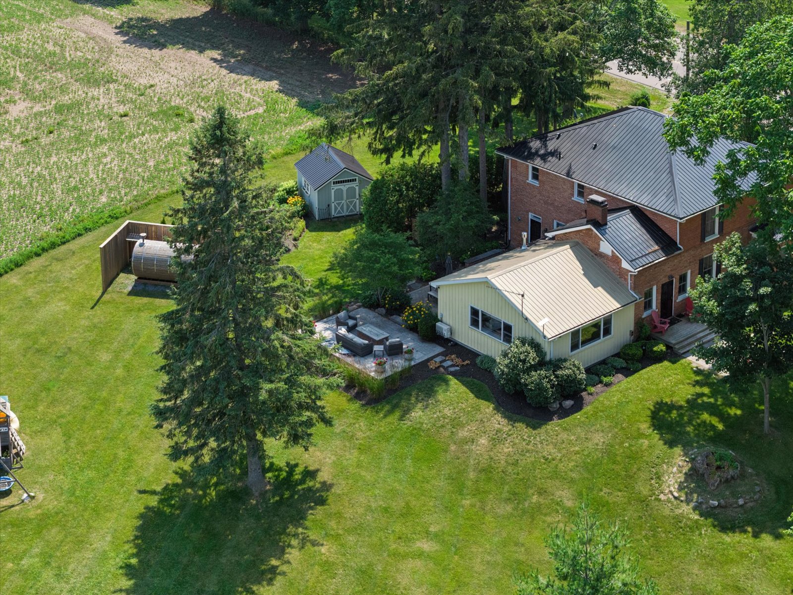 Aerial of the rear yard, sauna and garden shed