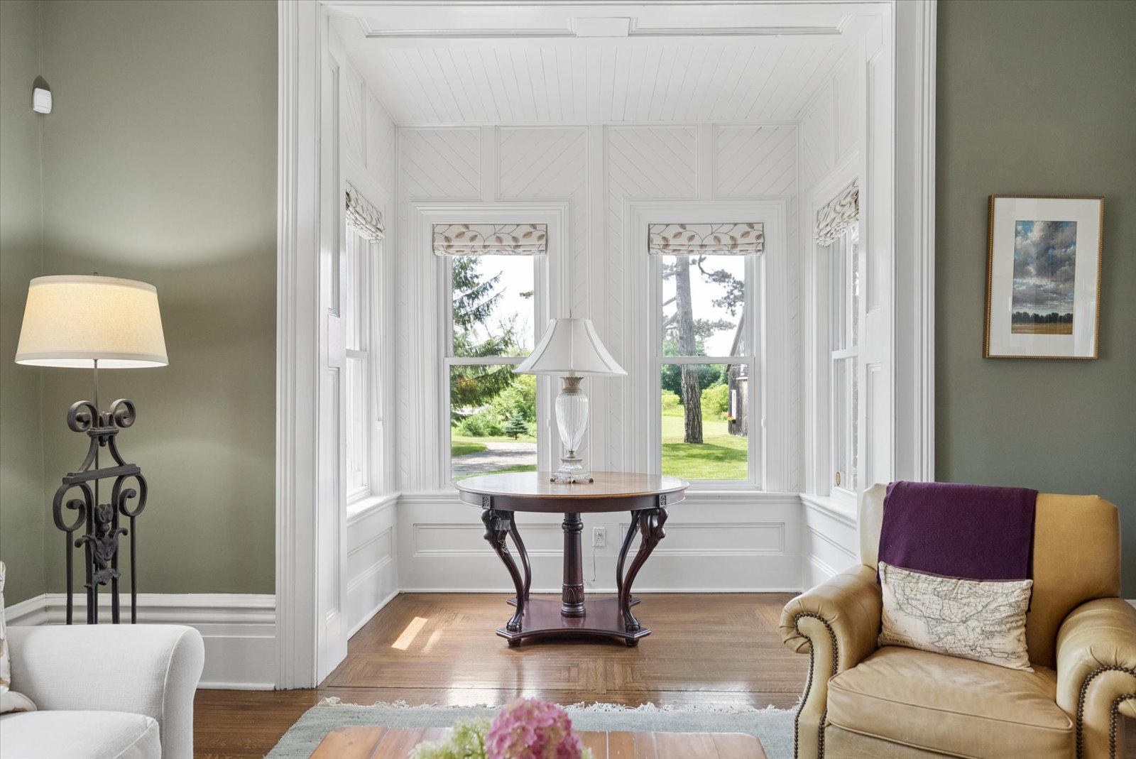 Panelled bay window nook overlooking the grounds
