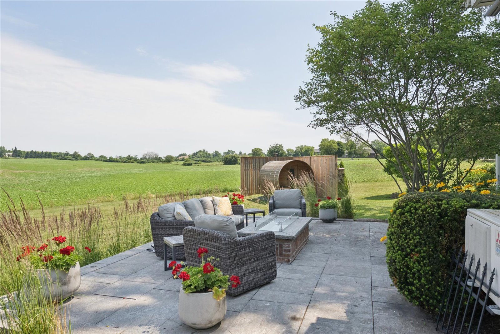 Fire-table lounge overlooking the fields