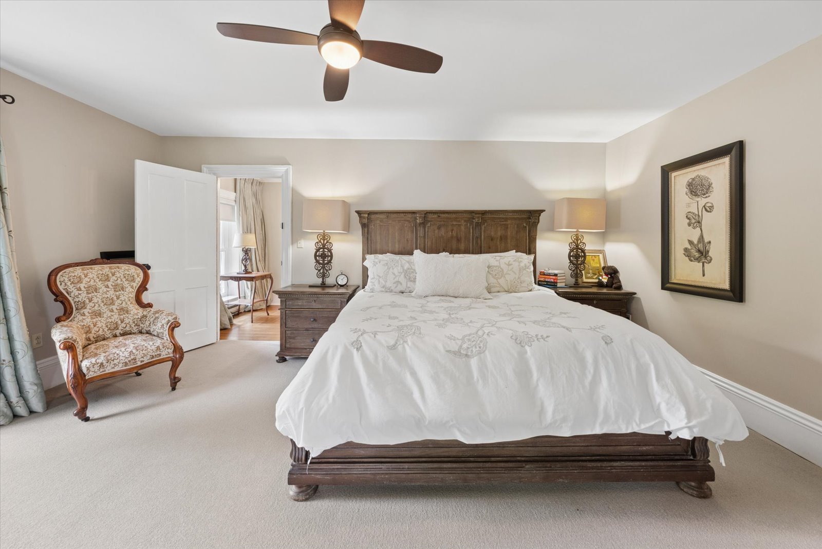 Principal bedroom with paired bedside lamps