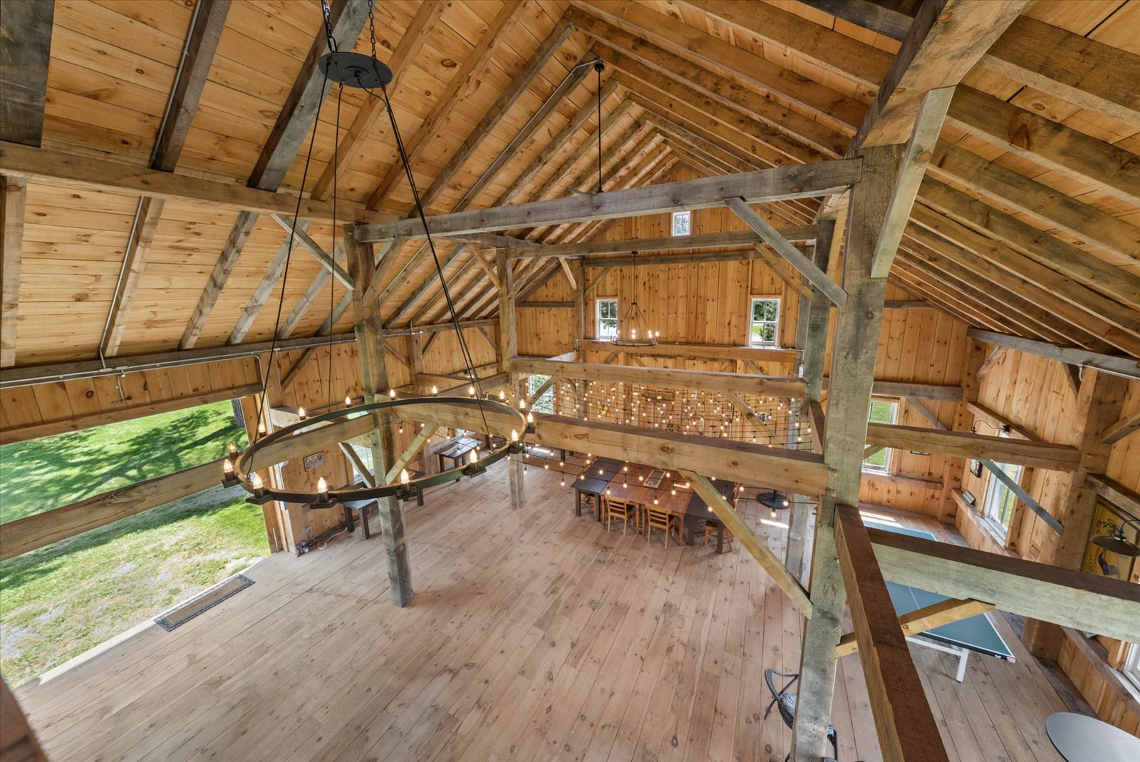 Looking down from the loft across the barn floor