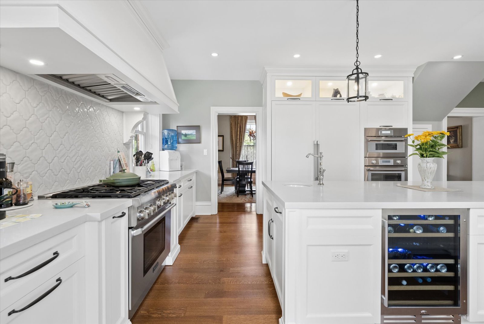 Kitchen range wall with custom hood and arabesque tile