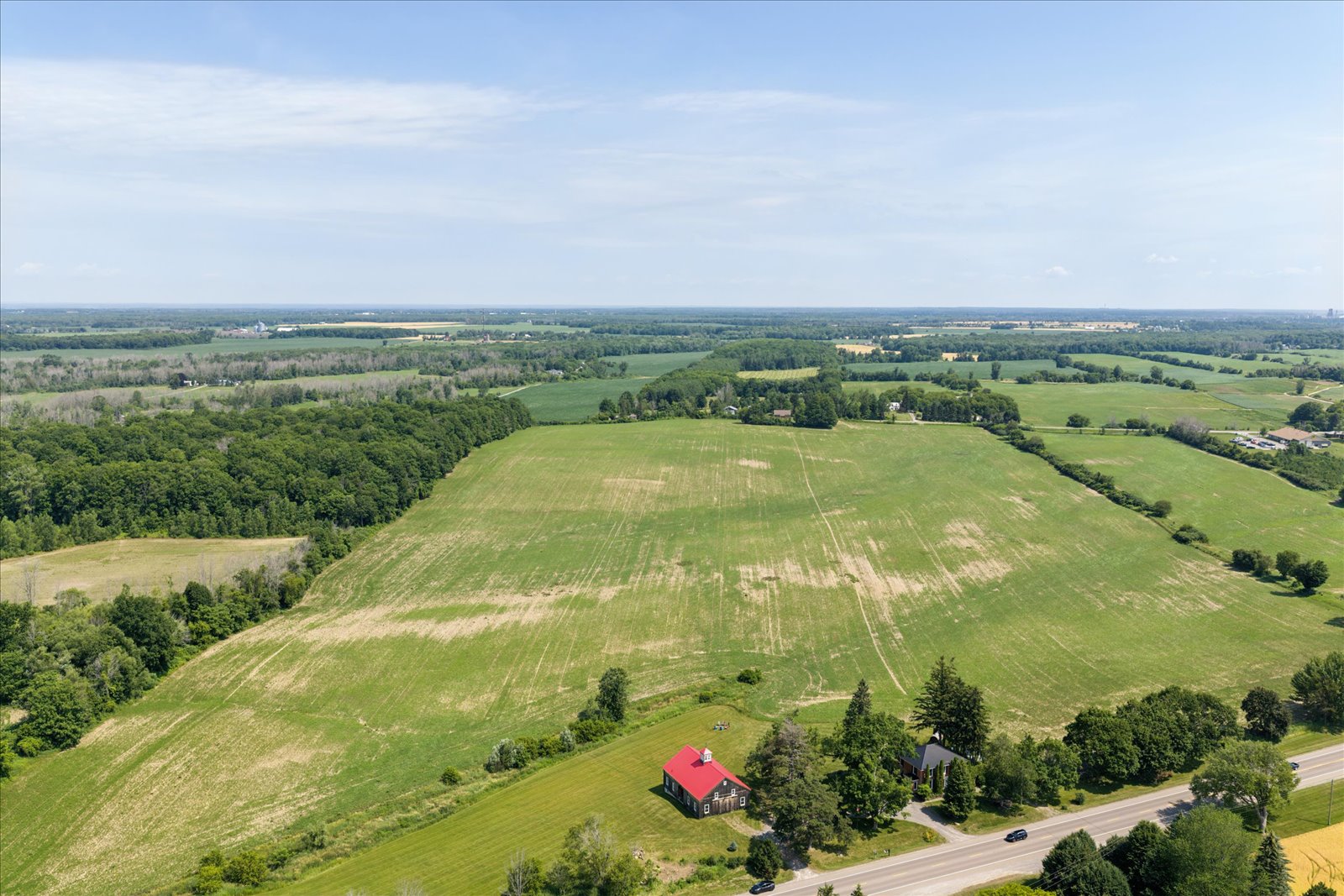 The 68 acres of workable land framed by hedgerows